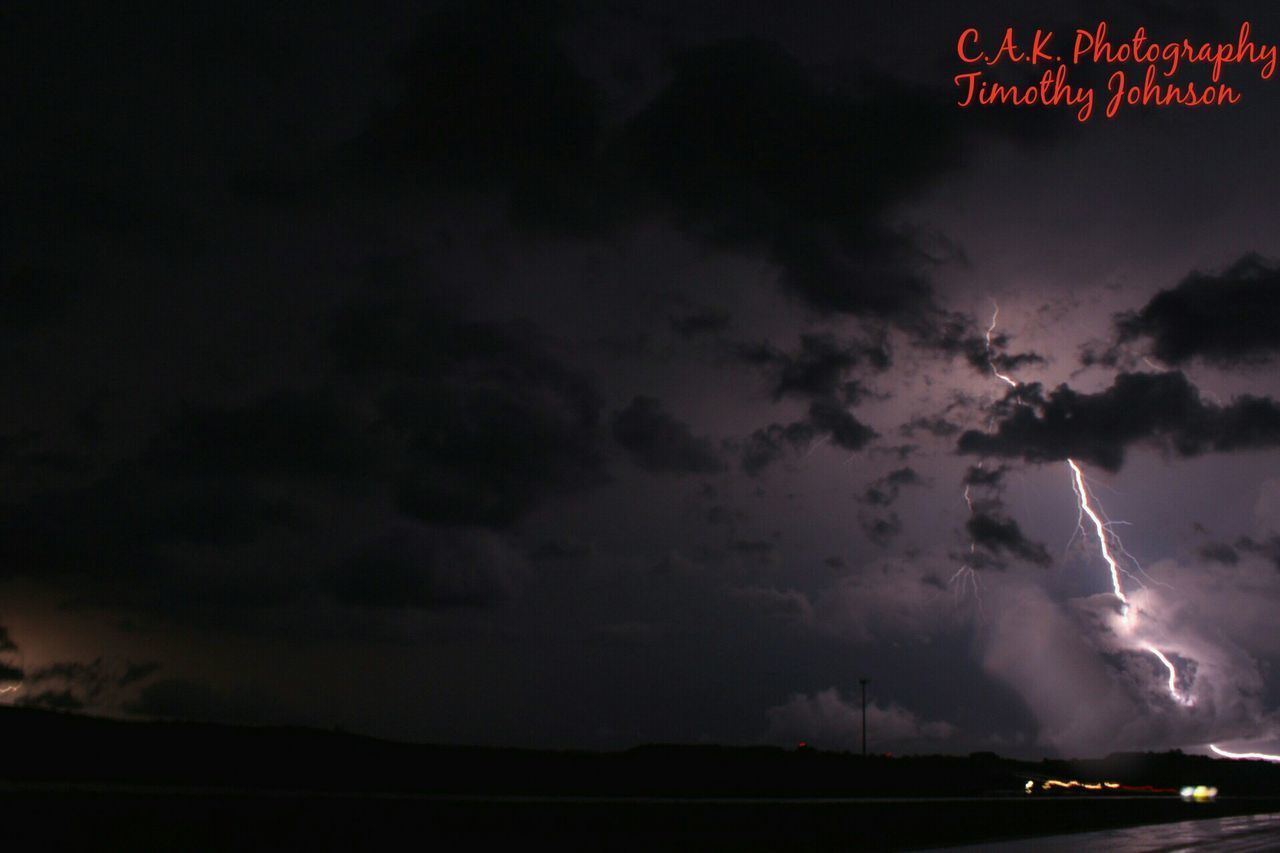 SCENIC VIEW OF STORM CLOUDS AT NIGHT