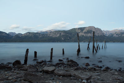 Scenic view of lake with mountains in background