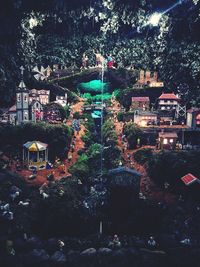 High angle view of illuminated buildings at night