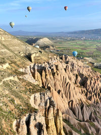 View of hot air balloon over rocks