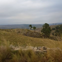 Scenic view of land against sky