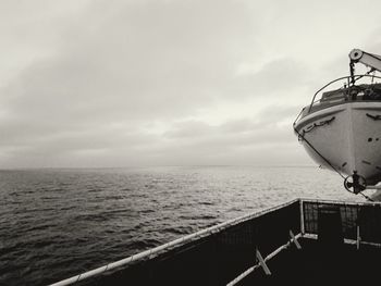 Nautical vessel on sea against sky