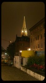 Buildings in city at night