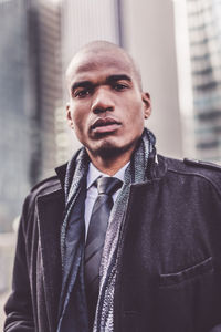 Portrait of man in city