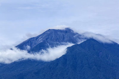 The peak of mount kerinci in jambi province of indonesia's slightly foggy 