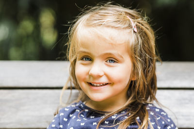 Close-up portrait of smiling girl