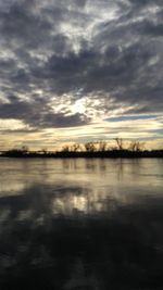 Reflection of clouds in sky during sunset