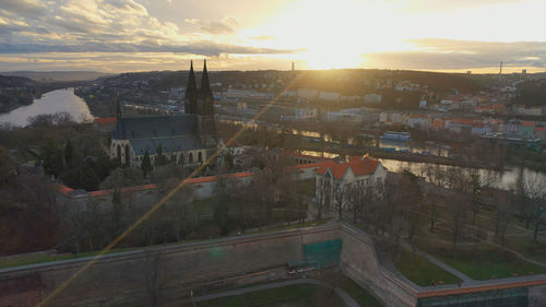 High angle view of buildings against sky during sunset