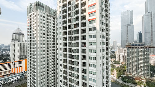 Low angle view of modern buildings in city