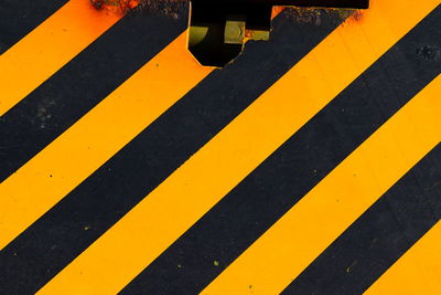 High angle view of yellow zebra crossing on road