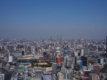 Cityscape against clear sky