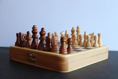 Close-up of chess pieces on board