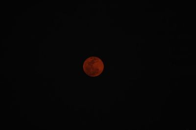 Scenic view of moon against clear sky at night