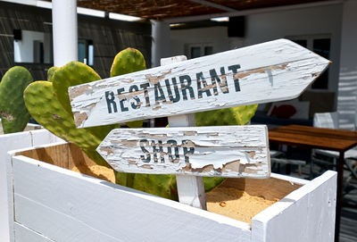 Close-up of text written on wood