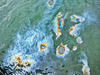 High angle view of oil spill in sea