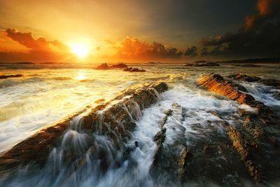 Scenic view of sea during sunset