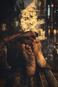 Homeless man sleeping on bench