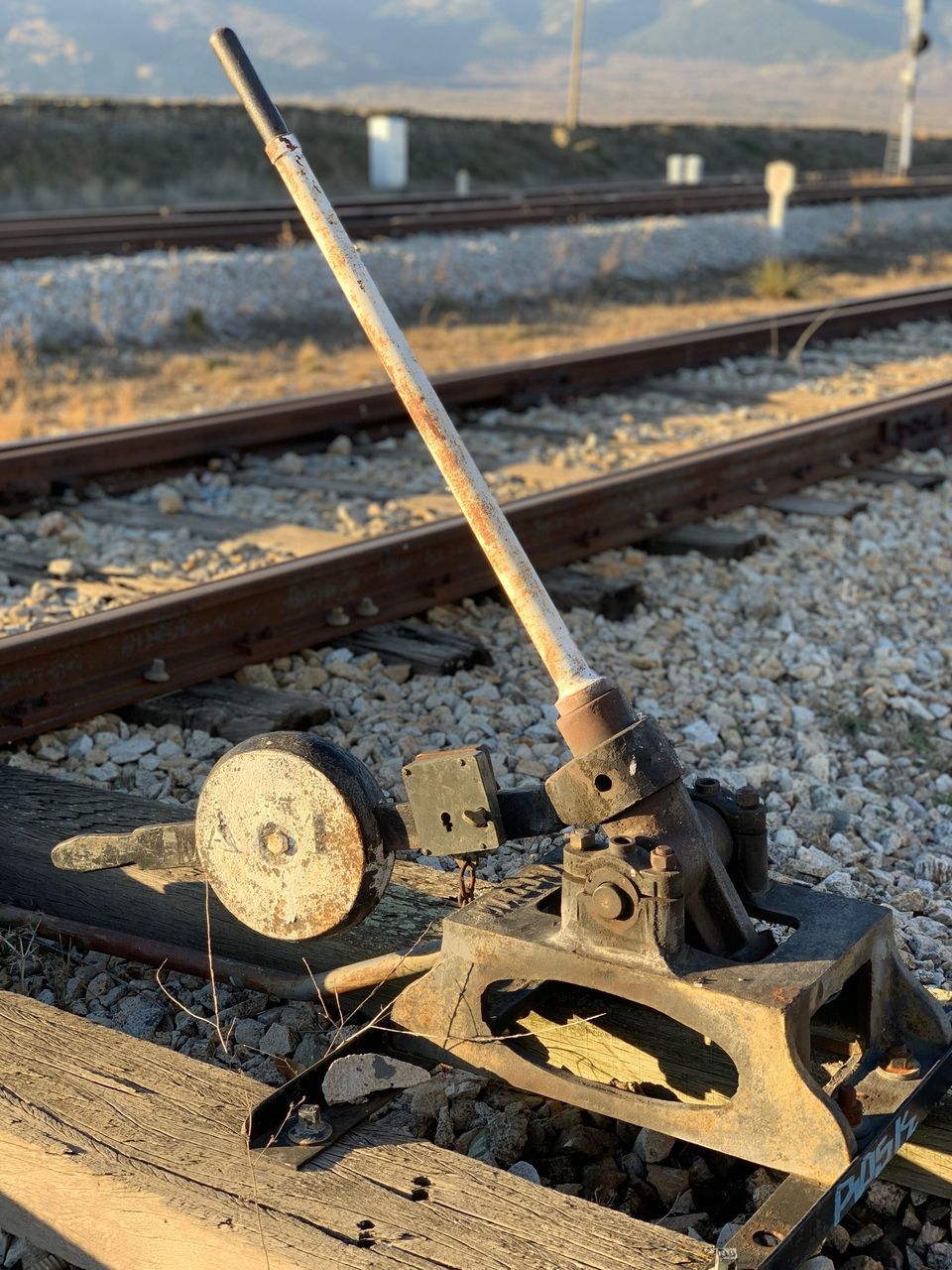 CLOSE-UP OF RUSTY RAILROAD TRACKS