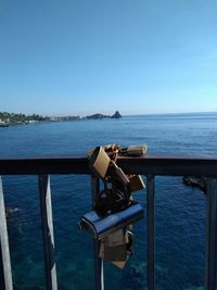Scenic view of sea against clear blue sky
