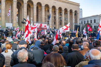 Group of people protesting on street