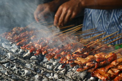 Close-up of meat on barbecue grill