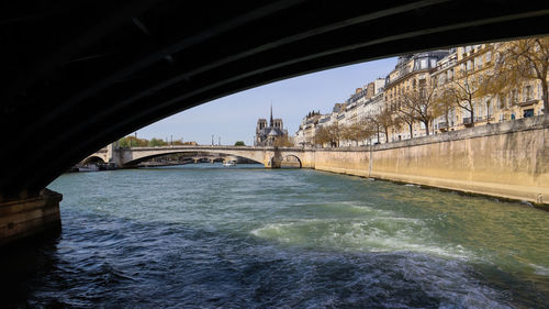 Arch bridge over river