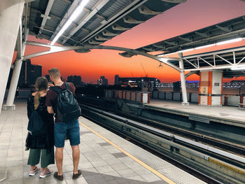 People on railroad station platform