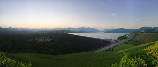 Scenic view of landscape against sky during sunset