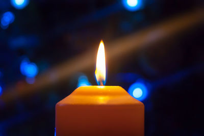 Close-up of burning candle
