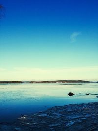 Scenic view of calm sea against sky