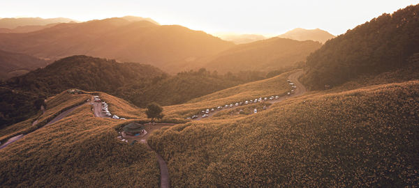 High angle view of road amidst mountains against sky