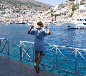 Rear view of boy looking at sea