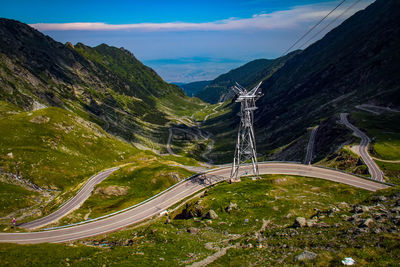 High angle view of road amidst mountains against sky