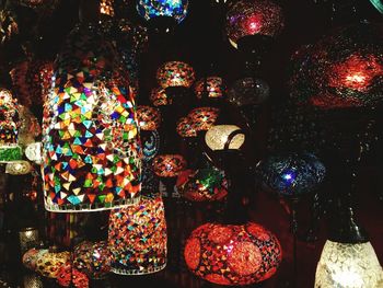 Multi colored lanterns for sale at night