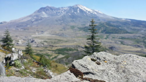 Close-up of mountain against clear sky