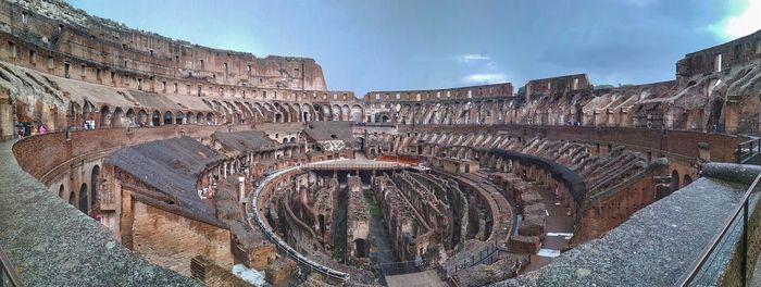 Panoramic view of old amphitheater against sky