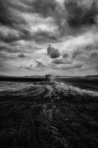 Scenic view of sea against cloudy sky