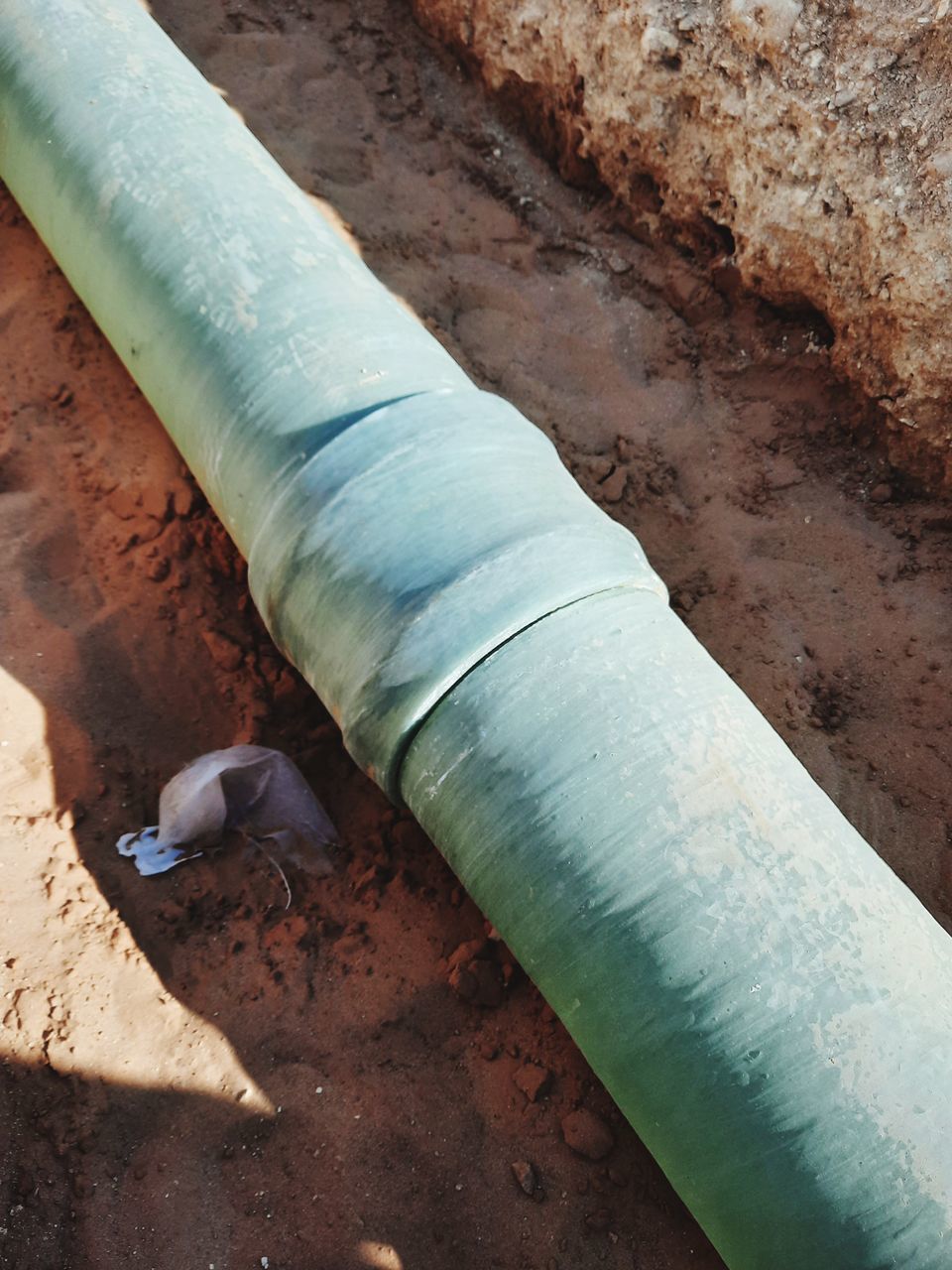 HIGH ANGLE VIEW OF PIPE