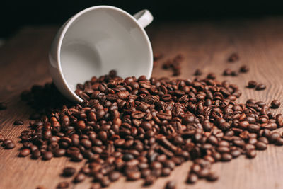 Close-up of coffee beans on table