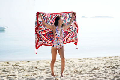 Full length of woman on beach