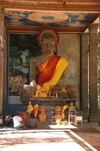 Statue outside temple in building