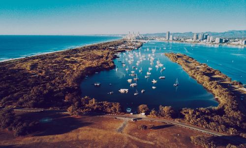 Scenic view of sea against clear blue sky