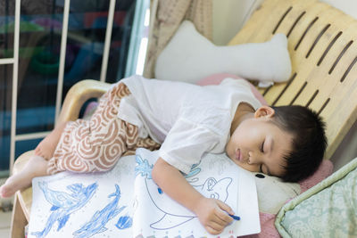 Girl lying on bed at home