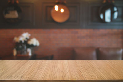 Close-up of illuminated lights on table at home