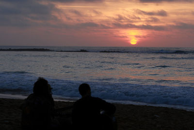 Scenic view of sea at sunset