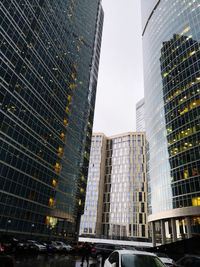 Modern buildings in city against sky