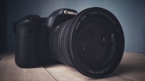 Close-up of camera on table