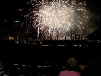 Firework display at night