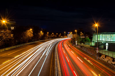 Light trails on city street at night