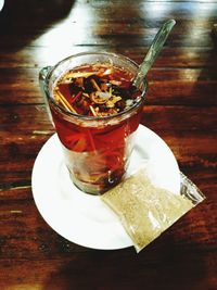 High angle view of tea in glass on table